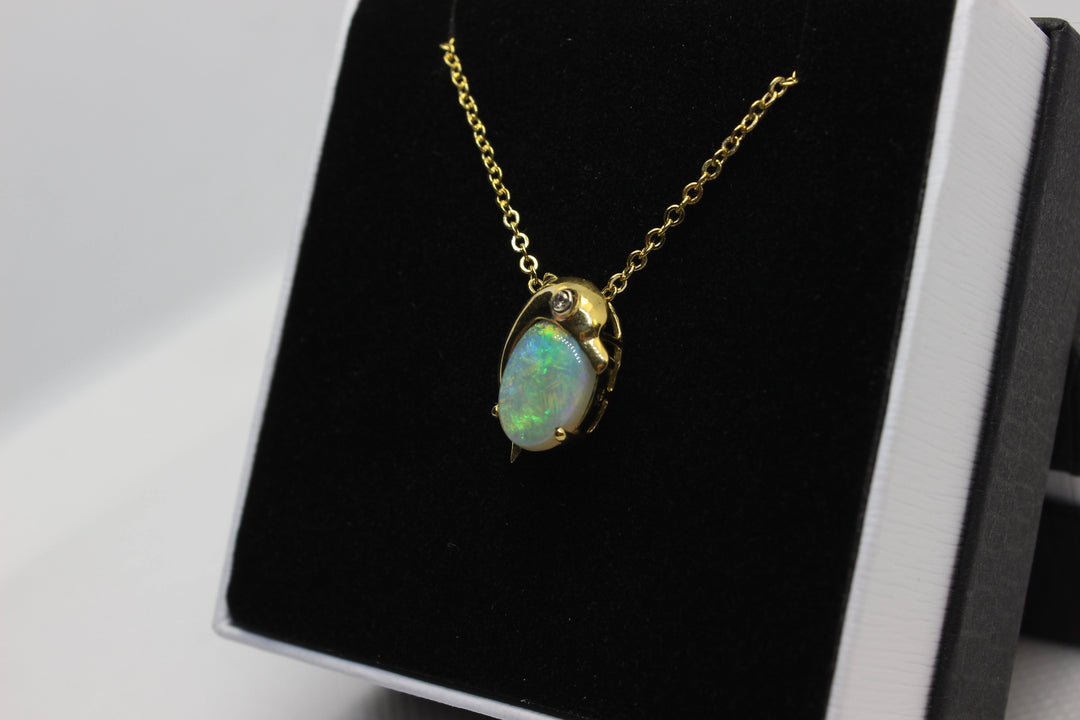 Australian Natural Fire Opal Pendant in 18k Yellow Gold Dolphin Setting with 1 Diamond Pendant Australian Opal House 