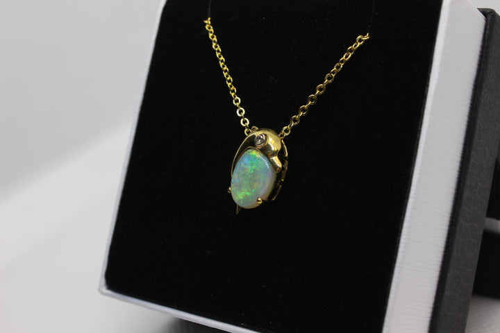 Australian Natural Fire Opal Pendant in 18k Yellow Gold Dolphin Setting with 1 Diamond Pendant Australian Opal House 